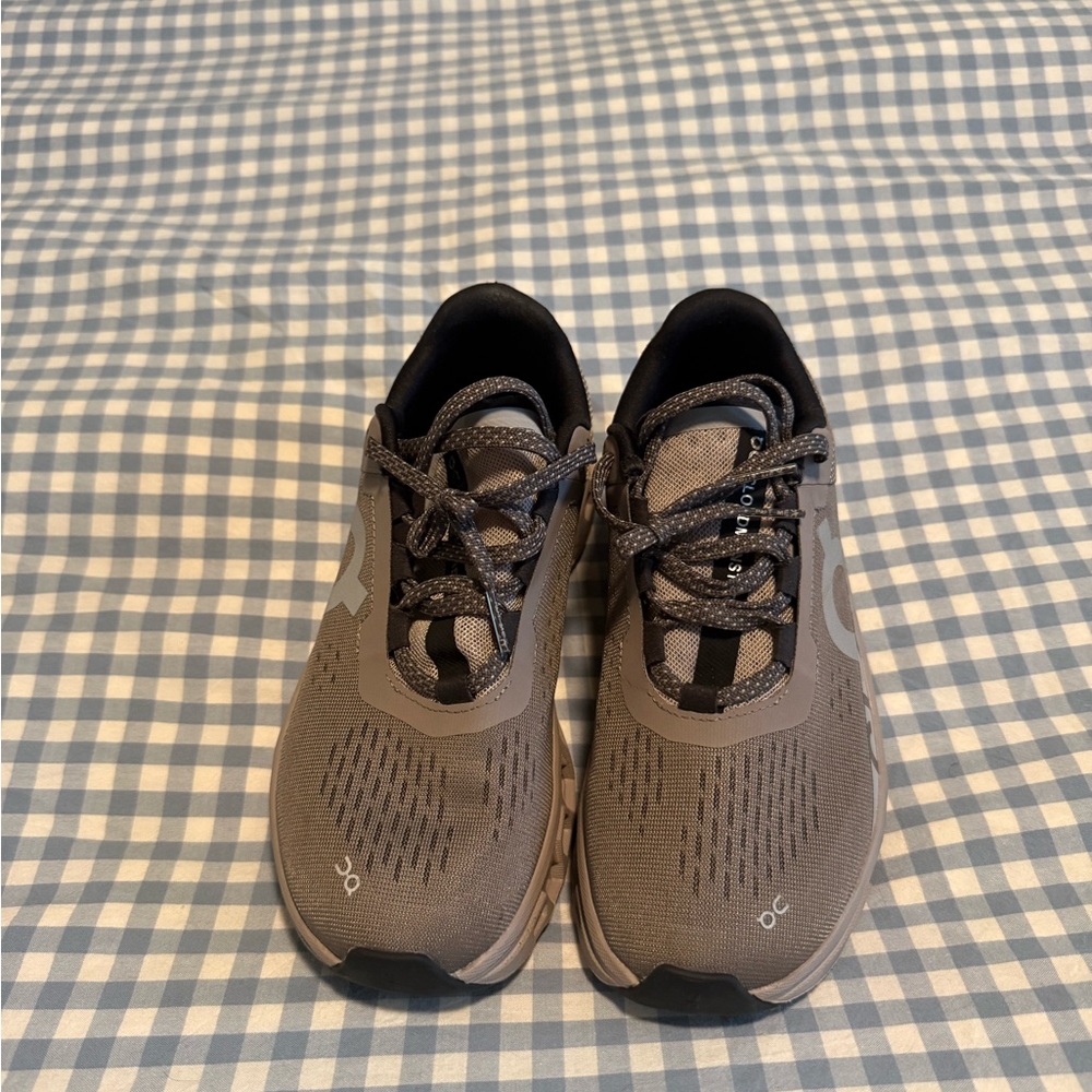 On Running Women’s Black and Gray Athletic Shoes